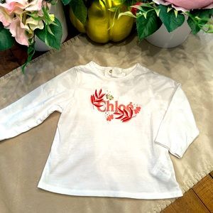 Baby Chloe size 6 months shirt. Like new from a pet free/smoke free home. 🌸🌺
